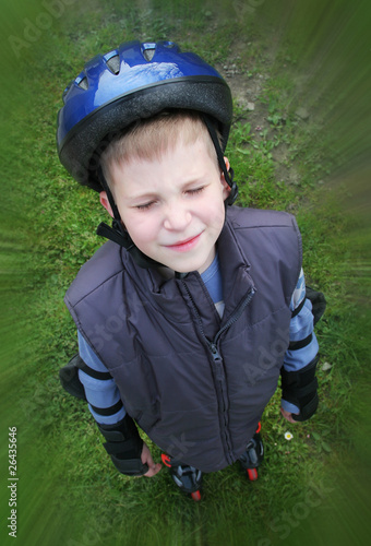 Photo: Closed eye rollerboy in blue helmet Closed eye rollerboy in blue helmet