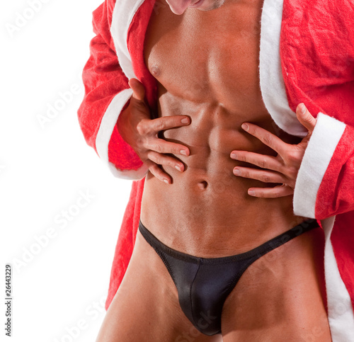 Photo: muscular santa claus show his abs muscular santa claus show his abs