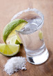 shot glass filled with clear cold alcohol shot glass filled with clear cold alcohol