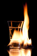 Flaming vodca, and lime over black Flaming vodca, and lime over black