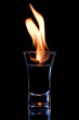 Flaming vodca, and lime over black Flaming vodca, and lime over black