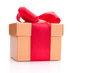 gold gift with the red ribbon isolated on white background