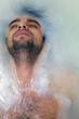 young sexual tanned naked guy in bath