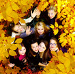 many young girls in the autumn park