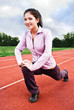 Photo: Athletic girl, stretching for training Athletic girl, stretching for training
