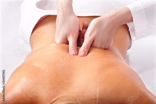 Foto: Massage of female back. Spa. Massage of female back. Spa.