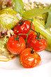salad with pear, cherry tomatoes and blue cheese
