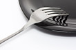 Black plate with fork