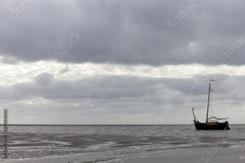 Photo: vintage sailing ship at low tide vintage sailing ship at low tide