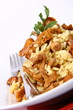 Risotto with mushrooms decorated with parsley and a fork