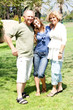 Daughter posing with her parents