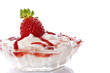 Strawberries and cream on white background