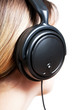Young woman with headphones close-up Young woman with headphones close-up