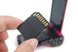 SD card with camcorder on white