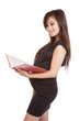 Pregnant woman with book reading