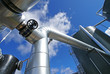 Industrial zone, Steel pipe-lines on blue sky Industrial zone, Steel pipe-lines on blue sky