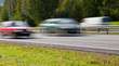 Photo: Fast moving cars during rush hour on highway Fast moving cars during rush hour on highway