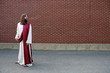 Photo: Jesus looking over his shoulder at blank wall Jesus looking over his shoulder at blank wall