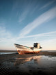 Aground boat on the beach Aground boat on the beach