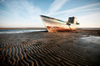 Aground boat on the beach Aground boat on the beach