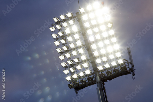 Photo: Stadium lights and dark blue sky Stadium lights and dark blue sky