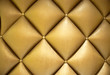 Brown button-tufted leather background
