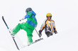 Schifahrer und Snowboarder