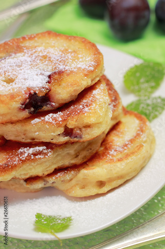 Photo: Blinis (from white flour, with plum) on plate Blinis (from white flour, with plum) on plate