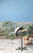 grill with meat on outdoor patio setting grill with meat on outdoor patio setting
