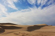 Sand dunes on sunny day