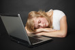 Woman tired from work in internet and went to sleep