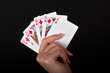 Royal Flush in Woman's hands