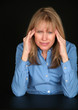 Photo: middle aged woman with headache middle aged woman with headache