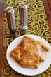 Photo: Whole uncooked marinated chicken on plate Whole uncooked marinated chicken on plate