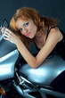Sexy girl model with a motobike