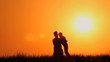 Happy family. A sunset. Silhouettes.
