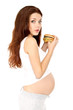 Pregnant eats sandwich