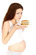 Pregnant eats sandwich