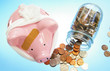 bandaged piggybank with coins (medical costs) bandaged piggybank with coins (medical costs)