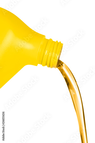 Photo: Oil flowing from container Oil flowing from container