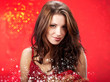 sexy girl smiles and holding a gift in magic packing