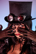Portrait of gothic girl wearing tophat
