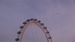 Video: View of London eye top with blue sky on background View of London eye top with blue sky on background