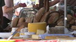 Close up of a cheese display in a market