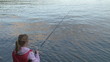 Video: Woman throwing her fishing rod in a river Woman throwing her fishing rod in a river