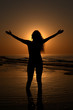 Silhouette of a woman on the beach Silhouette of a woman on the beach