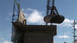Crane uploading merchandise in a port