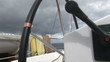 Close up of a boat wheel in the open sea