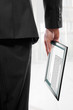 Businessman holding a touchpad pc with the email program