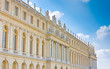 Palace side with statues on top in Versailles